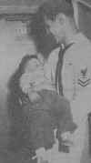 Luigi Coppola being carried by Navy Corpsman John Gloyd of the S.S. Thomas
