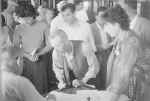 Survivors registering with officials on the Ile de France. Photo: Courtesy of Steven Bibb